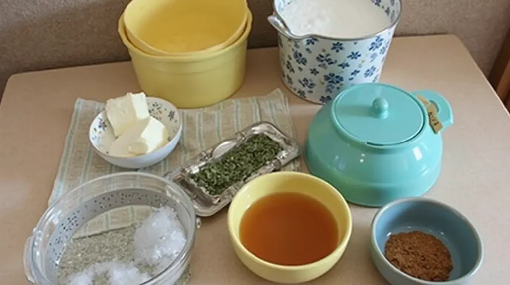 Essential tools and ingredients for making a Bluey cake, including cake pans, food coloring, fondant, piping bags, and decorating tools